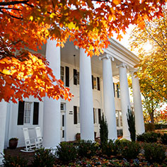 A building in the fall. Links to Gifts That Pay You Income